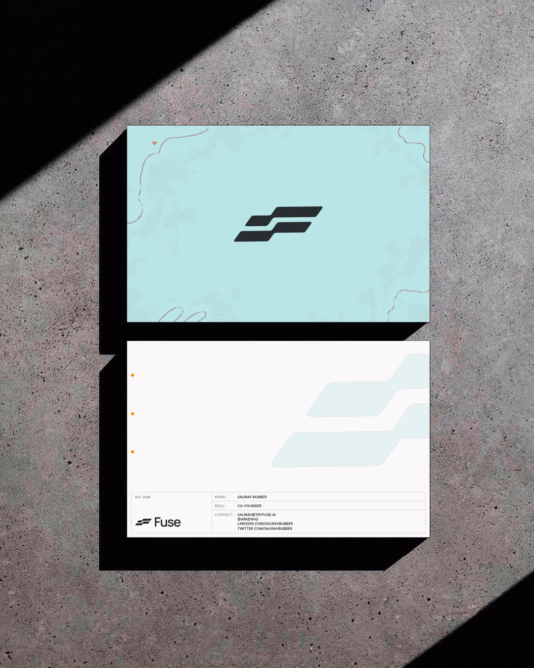 FuseAI business cards in mint and white