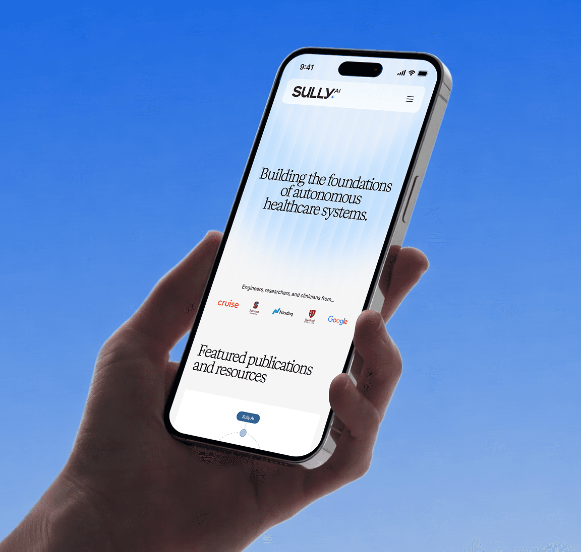 Sully.ai mobile homepage held in a hand against blue sky